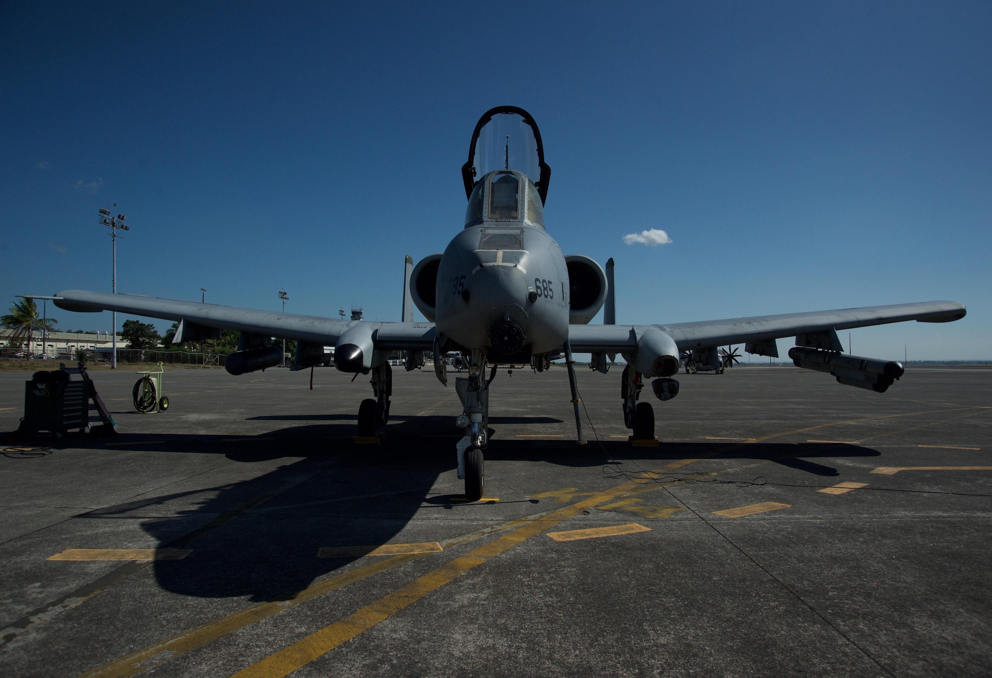 A U.S. Air Force A-10C Thunderbolt II sits the flight line at Clark Air Base, Philippines after flying a maritime domain awareness mission April 21, 2016.  The A-10C has a proven record operating out of short and varying airstrips, provide a flexible range of capabilities, and have a mission profile consistent with the air and maritime domain awareness operations the Air Contingent is conducting out of the air base. The A-10 is capable of loitering close to the surface for extended periods to allow for excellent visibility over land and sea domains. (U.S. Air Force photo by Capt. Susan Harrington)