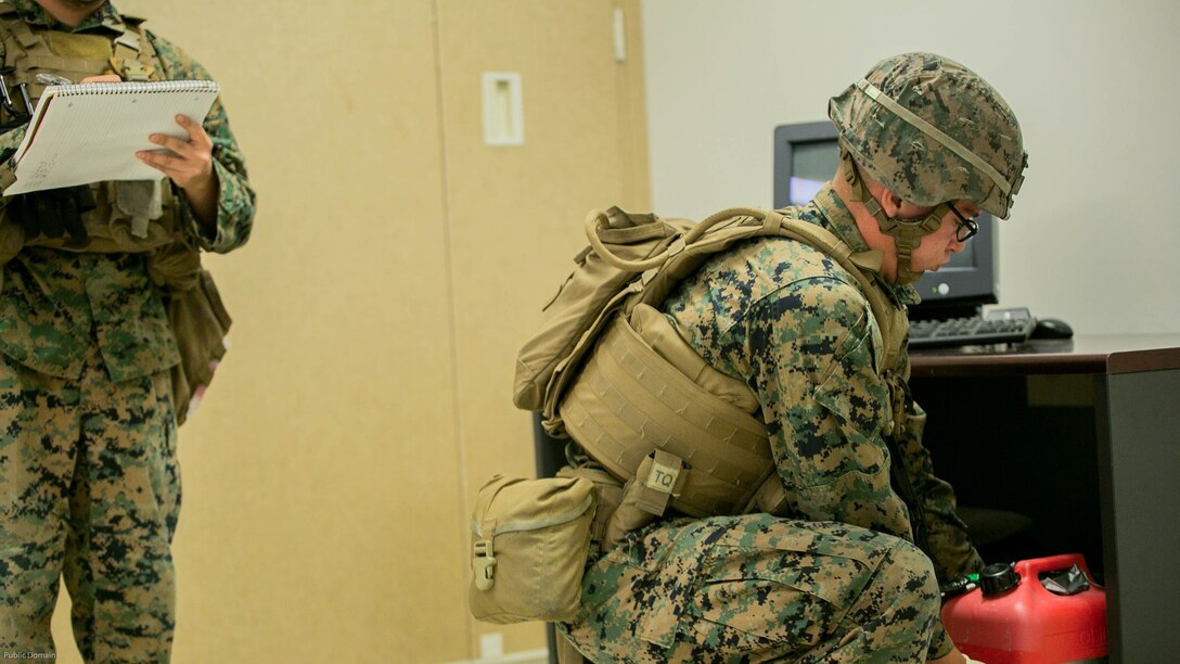 Marines found an improvised explosive device while searching a building during the Tactical Site Exploitation Course, taught by 2nd Law Enforcement Battalion, at Marine Corps Base Camp Lejeune N.C., April 20, 2016. During the exercise the students carefully photographed every inch of the room before entering, and then inspected the room for anything that could give them a hint as to who was in the room and what they were doing there.