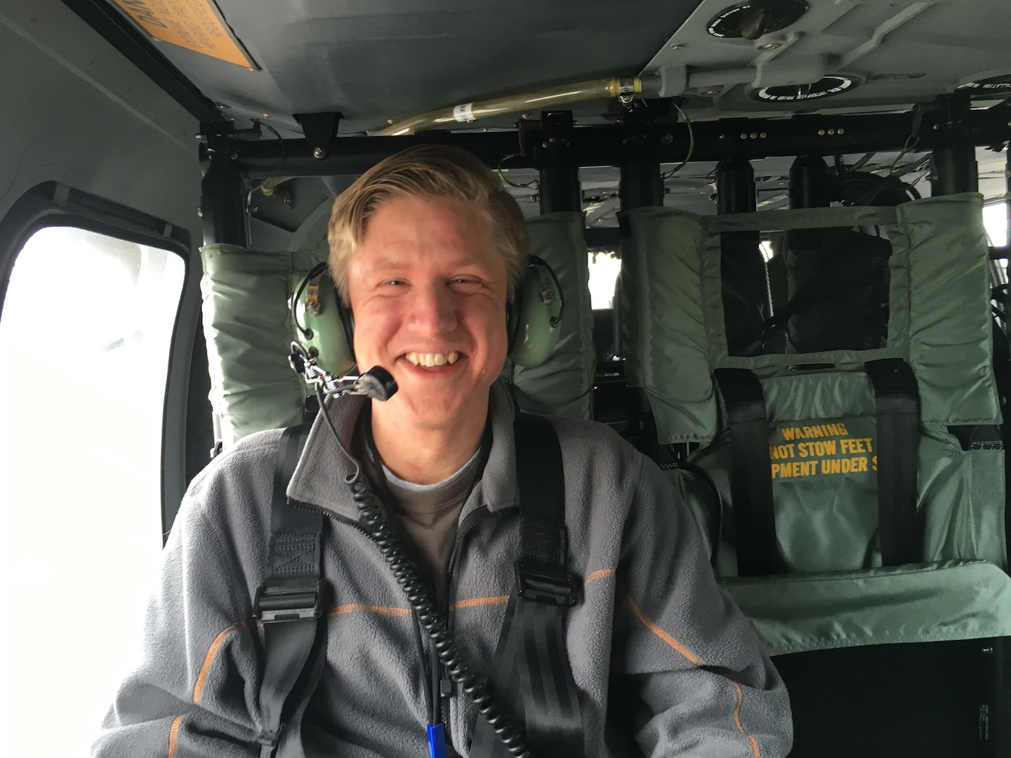 Erik Wetterhall, shown here aboard a UH-60M Blackhawk, is a customer logistics site specialist at Defense Logistics Agency Aviation at Huntsville, Alabama. Wetterhall was part of a support team traveling to Marietta Georgia April 6, 2016 to assist a Georgia National Guard unit with a fuel cell issue.