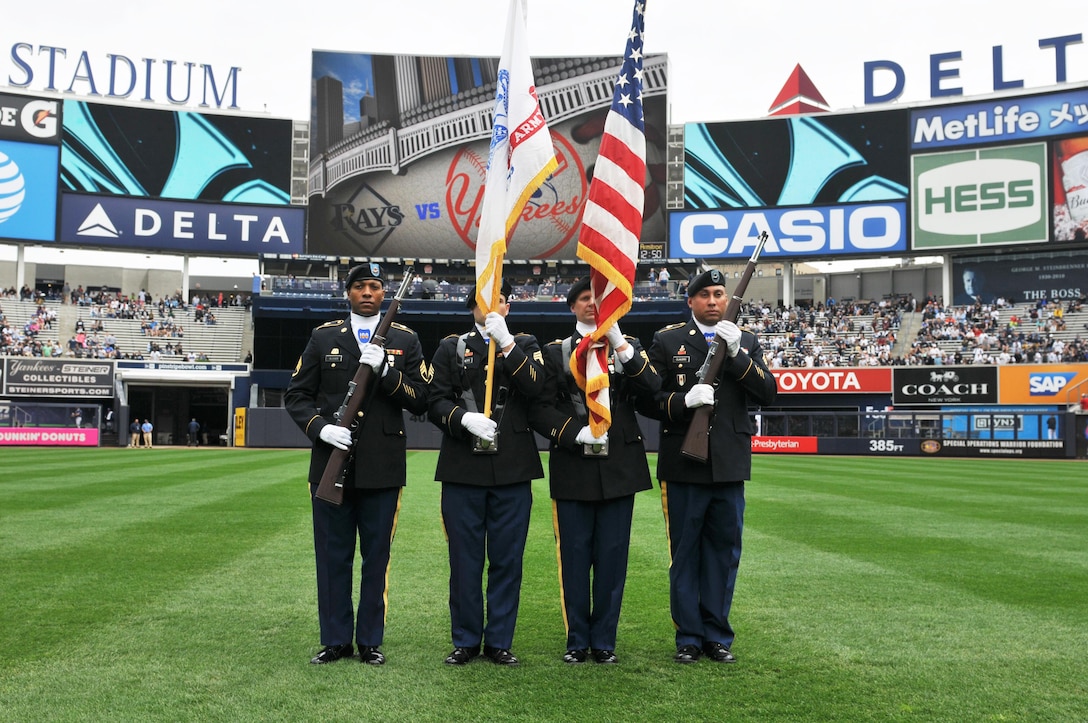 Staff Sgt. Adam Glover, Staff Sgt. Zachary Barrett, Staff Sgt. Harry Newman, and Staff Sgt. Luis Claudio with Headquarters and Headquarters Company, 3rd Brigade, 100th Division, from Ft. Totten in Queens provide the color guard on April 23, 2016, when the New York Yankees faced Tampa Bay Rays at Yankee Stadium. April 23rd marks the 108th anniversary of the United States Army Reserve. Army Reserve Soldiers are currently supporting all military branches and have been a vital part of our national military strategy during peacetime and war since it's founding in 1908. (U.S. Army Photo by Sgt. Nicole Paese)