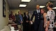 Maj. Gen. Richard S. Haddad, AFRC vice commander, embraces retired Lt. Col. Craig Branning's daughter during the dedication ceremony April 16 at HQ AFRC on Robins Air Force Base, Ga. Branning worked for 20 years as a military member and civil service employee in the Directorate of Strategic Plans, Programs and Requirements as chief of the strategic basing and total force branch and passed away in his office four years ago.  