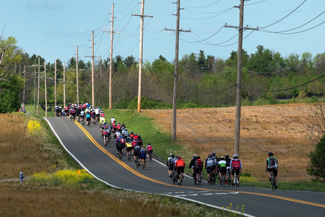 Active-duty service members, veterans and civilian cyclists travel through rural Frederick, Md., April 23, 2016, during the Face of America bike ride. DoD photo by EJ Hersom