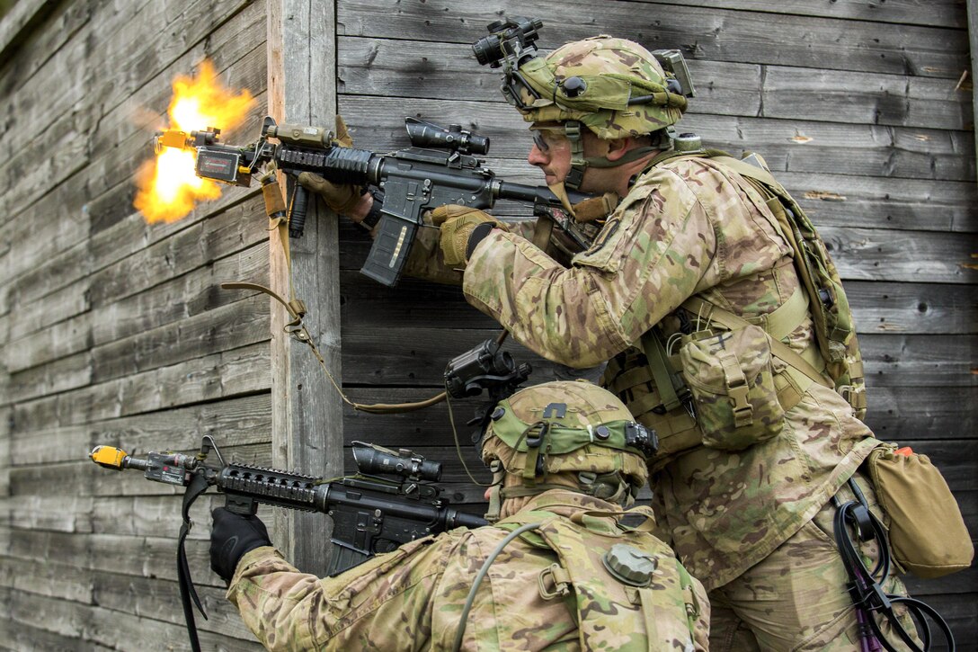 Soldiers provide suppressive fire during a simulated air assault operation as part of exercise Saber Junction 16 in Grafenwoehr, Germany, April 18, 2016. Army photo by Pfc. Randy Wren