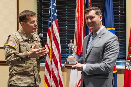 Lt. Gen. Jeffrey W. Talley, Chief, U.S. Army Reserve and U.S. Army Reserve Command commanding general, presents the Hon. Patrick J. Murphy, Acting Secretary of the Army, with a statue of John Parker, the symbol of the U.S. Army Reserve at the Iron Mike Conference, April 23, 2016, Fort Bragg, NC. Murphy summed his time with the U.S.Army Reserve senior leaders by saying the Army is “America’s varsity team” and needs to be ready at a moment’s notice. And the U.S. Army Reserve is an integral part of the team. “When the President or these governors ask us to respond, we can’t say, ‘I’m sorry.’ We’ve got to be ready to go. We’ve got be ready to go tonight. That’s why readiness is so important,” Murphy said. He also was the guest speaker later in the evening at the U.S. Army Reserve 108th anniversary ball. (U.S. Army photo by Timothy L. Hale) (Released)