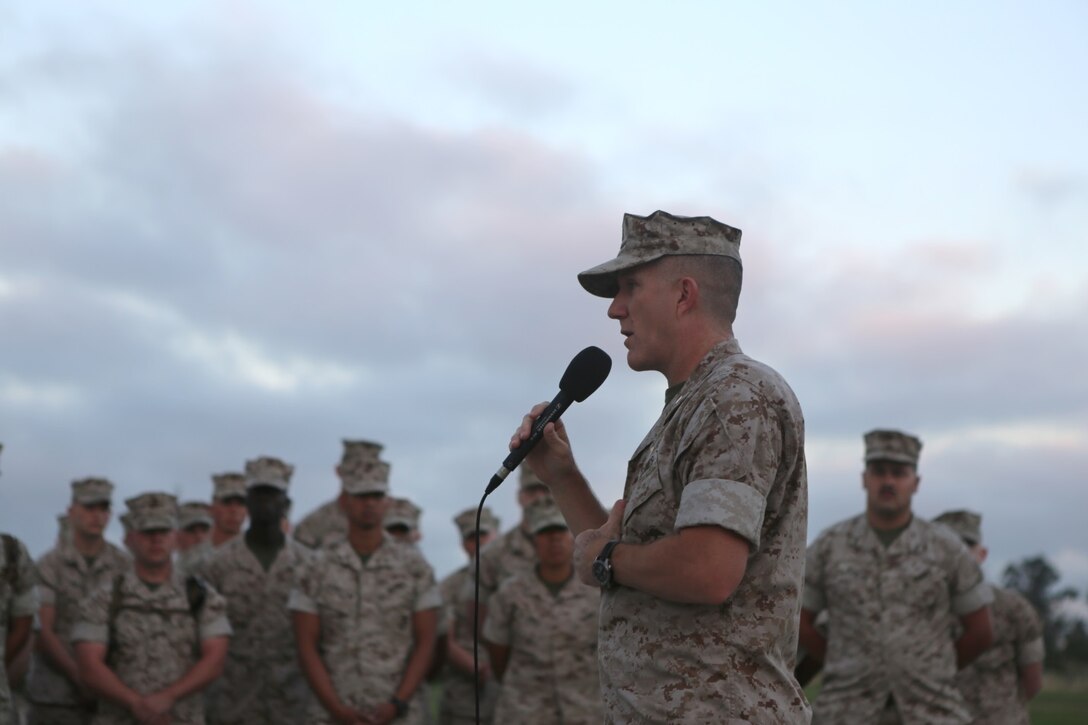 Col. Jason Woodworth, commanding officer of Marine Corps Air Station Miramar, addresses Marines before a base-wide clean up aboard MCAS Miramar, Calif., April 22. MCAS Miramar conducts base-wide cleanups semi-annually, this involves service members clearing litter, pulling weeds and mowing the grass on and off the installation. (U.S. Marine Corps photo by Pfc. Liah Kitchen/Released)