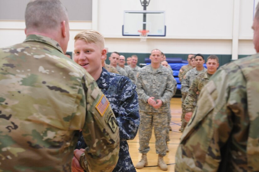 Army 2nd Lt. Sheldon R. Helm of the 17th FAB and his brother Naval Petty Officer Third Class Sydney R. Helm of Naval Station Everett competed in the GAFPB event together and both earned the Gold Badge during the event held at Naval Station Everett Apr. 12-14.