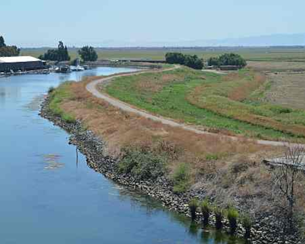 The water level behind a levee in California’s Sacramento-San Joaquin Delta, shown Aug. 16, 2011, is higher than the surrounding land, showing the risk of flooding throughout the region. Under the CALFED Levee Stability Program, the U.S. Army Corps of Engineers Sacramento District is studying how best to quickly fix urgent levee problems while a longer-term plan for reducing flood risk throughout the Delta is developed. (U.S. Army Photo/Chris Gray-Garcia)