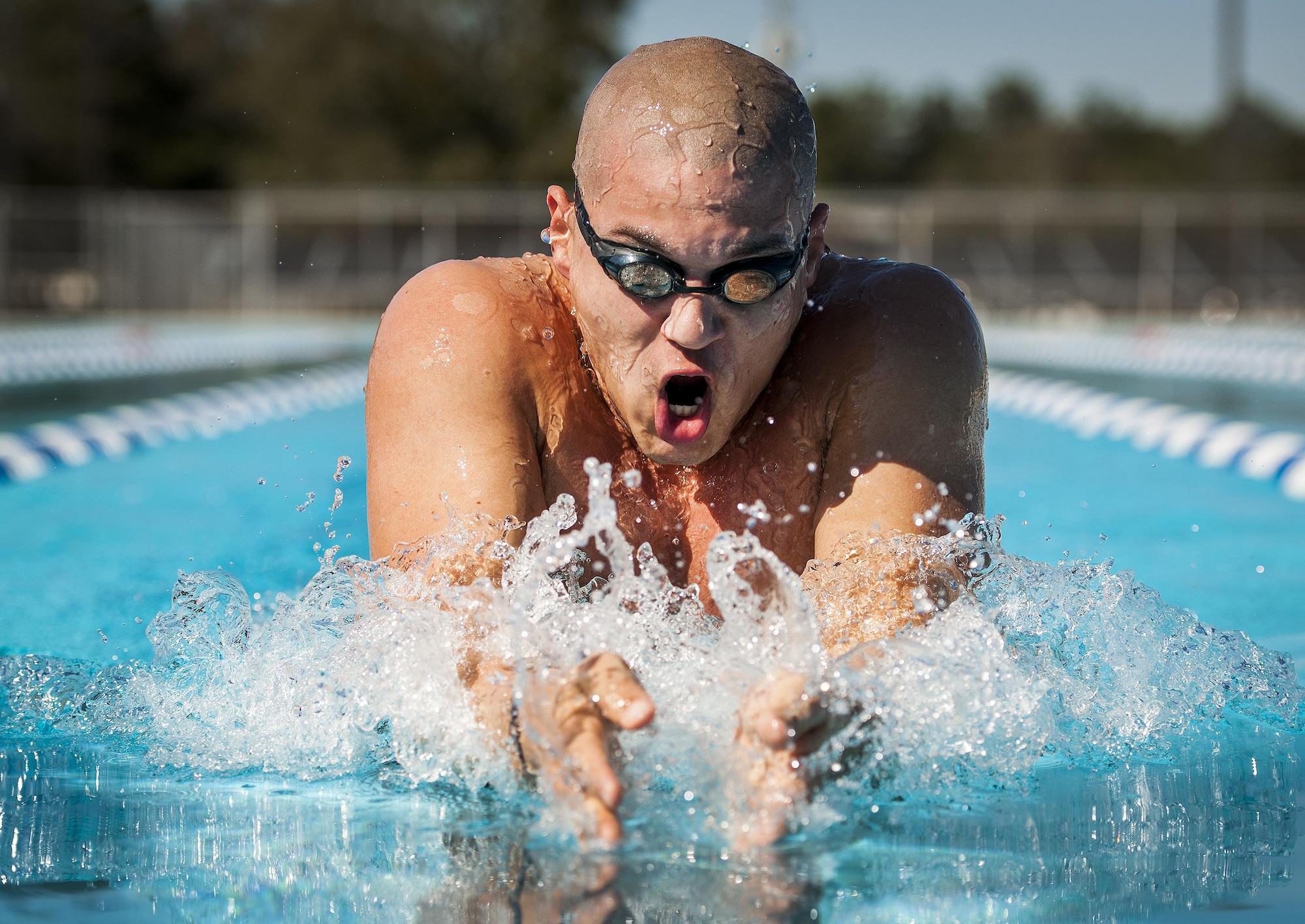 Senior Airman Francisco Perez Castillo, of the 96th Maintenance Group, comes up for air while swimming the breaststroke March 22, 2016, at Eglin Air Force Base, Fla. The 26-year-old Airman was recently inducted into the Pontifical Catholic University of Puerto Rico’s sports hall of fame. (U.S. Air Force photo/Samuel King Jr.)