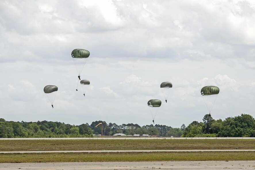 U.S. Air Force Airmen from the 820th Base Defense Group descend onto the newly dedicated Lee D. Fulp Drop Zone, April 21, 2016, at Henry Tift Myers Airport, Tifton, Ga. Tech. Sgt. Lee Fulp served four tours in Afghanistan and Iraq. (U.S. Air Force photo by Airman 1st Class Janiqua P. Robinson/Released) 