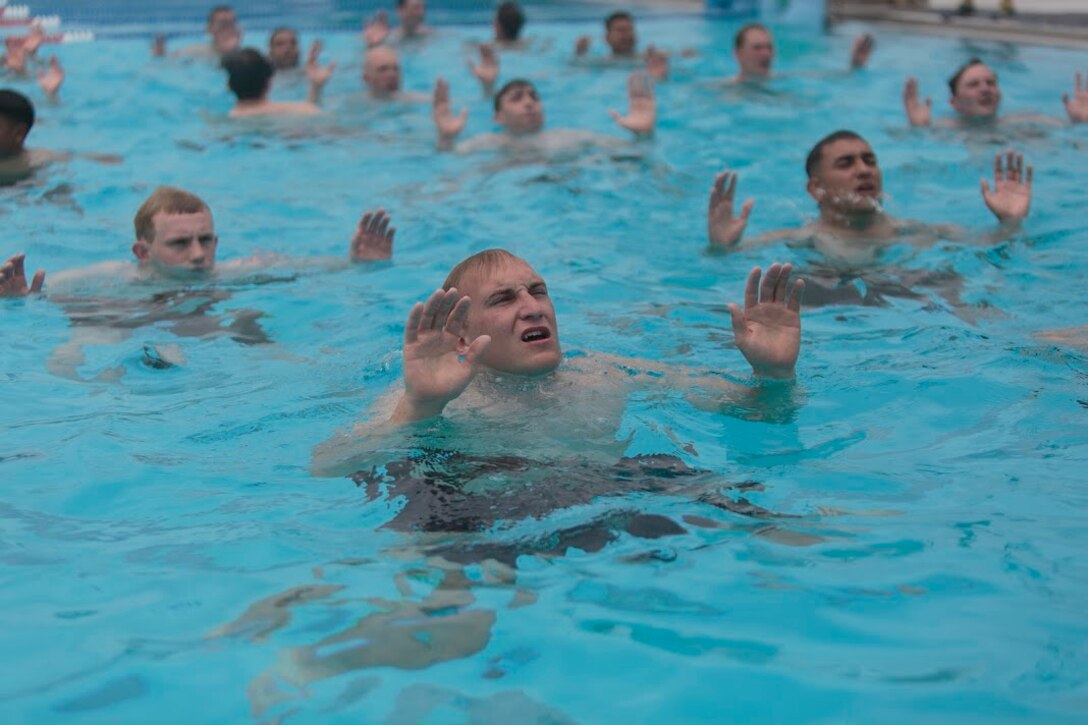 Sailors from Marine Forces Reserve and the U.S. Navy Reserve tread water as part of a water confidence exercise during a Fleet Marine Force reconnaissance corpsman screening in San Antonio, April 19, 2016. The screening was hosted by 4th Reconnaissance Battalion, 4th Marine Division, Marine Forces Reserve, for Reserve Sailors to gain familiarity with the demands of the FMF reconnaissance corpsman pipeline. 
