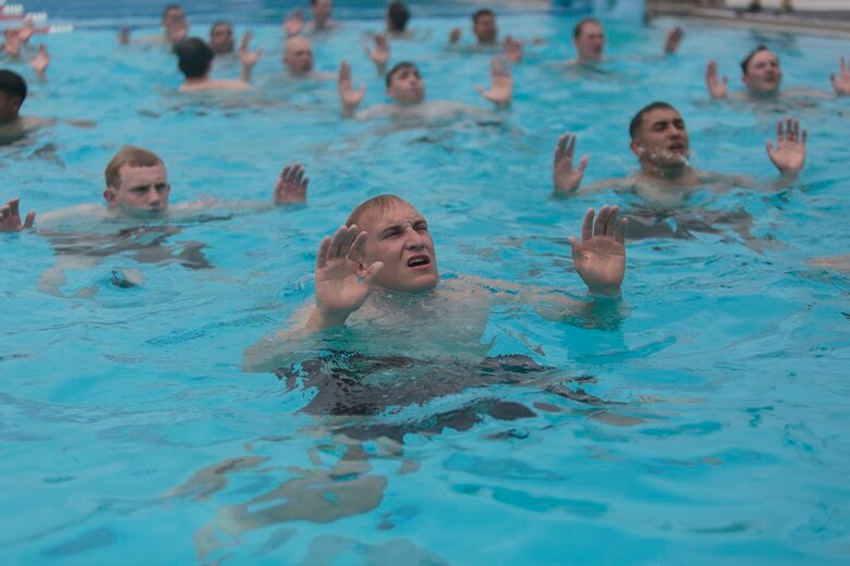 Sailors from Marine Forces Reserve and the U.S. Navy Reserve tread water as part of a water confidence exercise during a Fleet Marine Force reconnaissance corpsman screening in San Antonio, April 19, 2016. The screening was hosted by 4th Reconnaissance Battalion, 4th Marine Division, Marine Forces Reserve, for Reserve Sailors to gain familiarity with the demands of the FMF reconnaissance corpsman pipeline. 