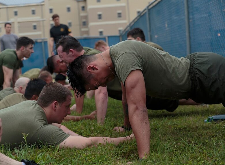 Petty Officer 2nd Class Thomas O. Dugan (right), a hospital corpsman with Headquarters and Service Company, 6th Engineer Support Battalion, 4th Marine Logistics Group, Marine Forces Reserve, completes the initial physical screening test for a Fleet Marine Force reconnaissance corpsman evaluation in San Antonio, April 19, 2016. The screening was hosted by 4th Reconnaissance Battalion, 4th Marine Division, Marine Forces Reserve, for Sailors across Marine Forces Reserve and the U.S. Navy Reserve to gain familiarity with the demands of the FMF reconnaissance corpsman pipeline. 