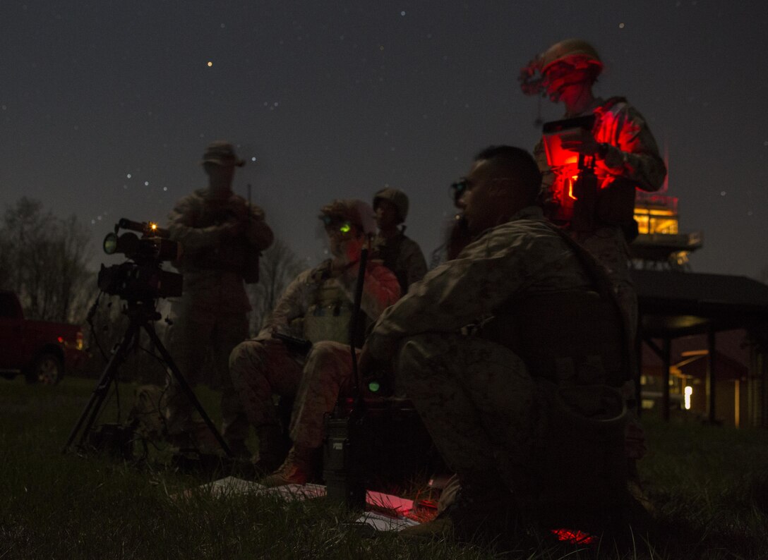 Reserve Marines with 2/24 Battalion, 23rd Marine Regiment, 4th Marine Division, Marine Forces Reserve, and 4th Air Naval Gunfire Liaison Company, Force Headquarters Group, MFR, call in fire support from pilots manning the A-10 Thunderbolt II, a low-altitude close air support aircraft, while conducting night operations during a fire support coordination exercise in Camp Atterbury, Ind., April 15, 2016. The Reserve Marines coordinated with both the U.S. Army and U.S. Air Force to conduct combined arms training during the exercise. 