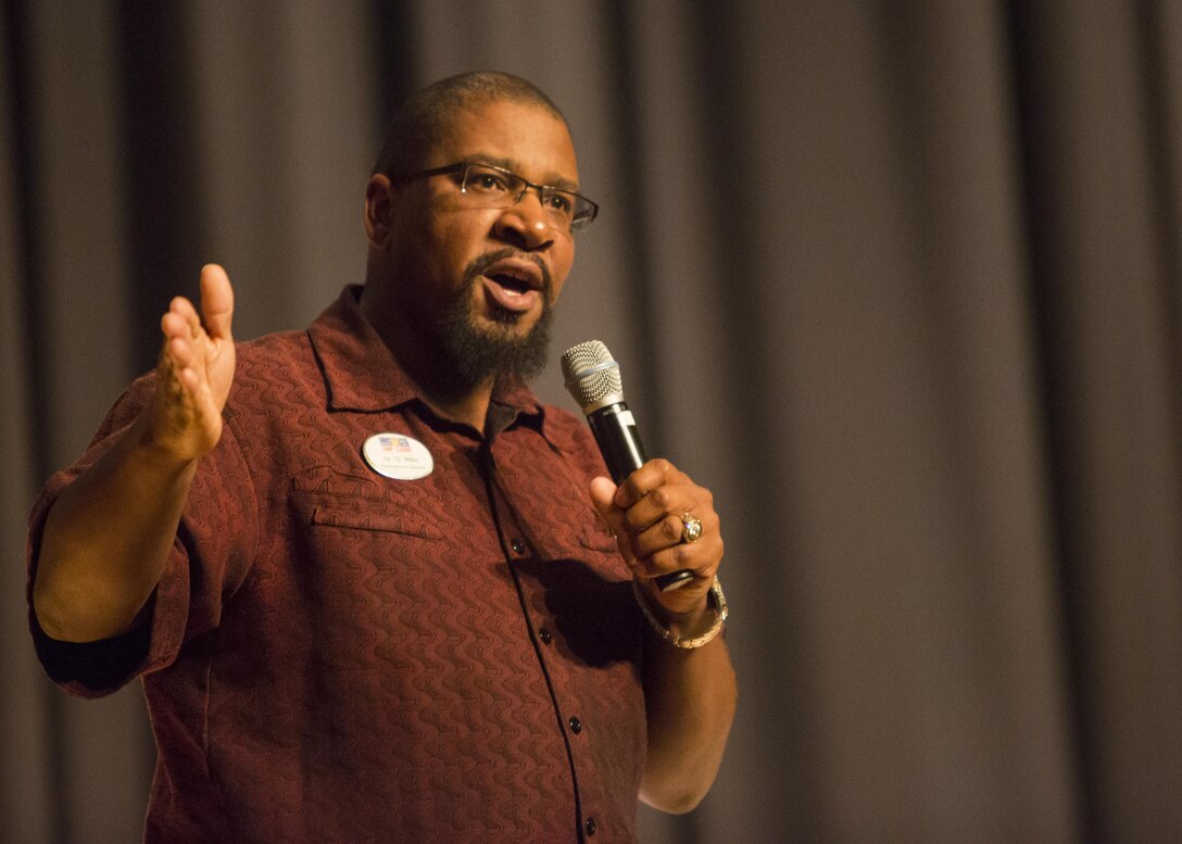 Dr. Gayloyce Willis, the Prevention and Education Specialist from Marine and Family Services, tells his emotional story of surviving child abuse to the Marines and Sailors of 10th Marine Regiment during a child abuse awareness and prevention symposium at Camp Lejeune, N.C., April 22, 2016. The purpose of the symposium was to make the Marines aware of the various resources available to them through their units and Marine Corps Community Services. (U.S. Marine Corps photo by Cpl. Michelle Reif/Released.)