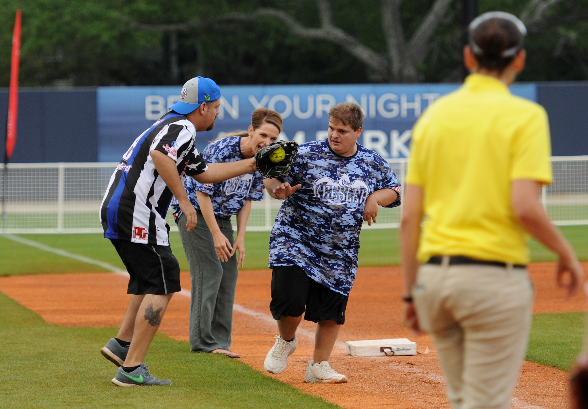 Zachery Cerone, Special Olympics athlete, rounds third base during the “Boots versus Badges” softball game at the Biloxi Shuckers MGM Park April 21, 2016, Biloxi, Miss. The game was the kickoff event for the 2016 Special Olympics Mississippi Summer Games, which will be hosted by Keesler Air Force Base, Miss., May 20-21. (U.S. Air Force photo by Kemberly Groue)