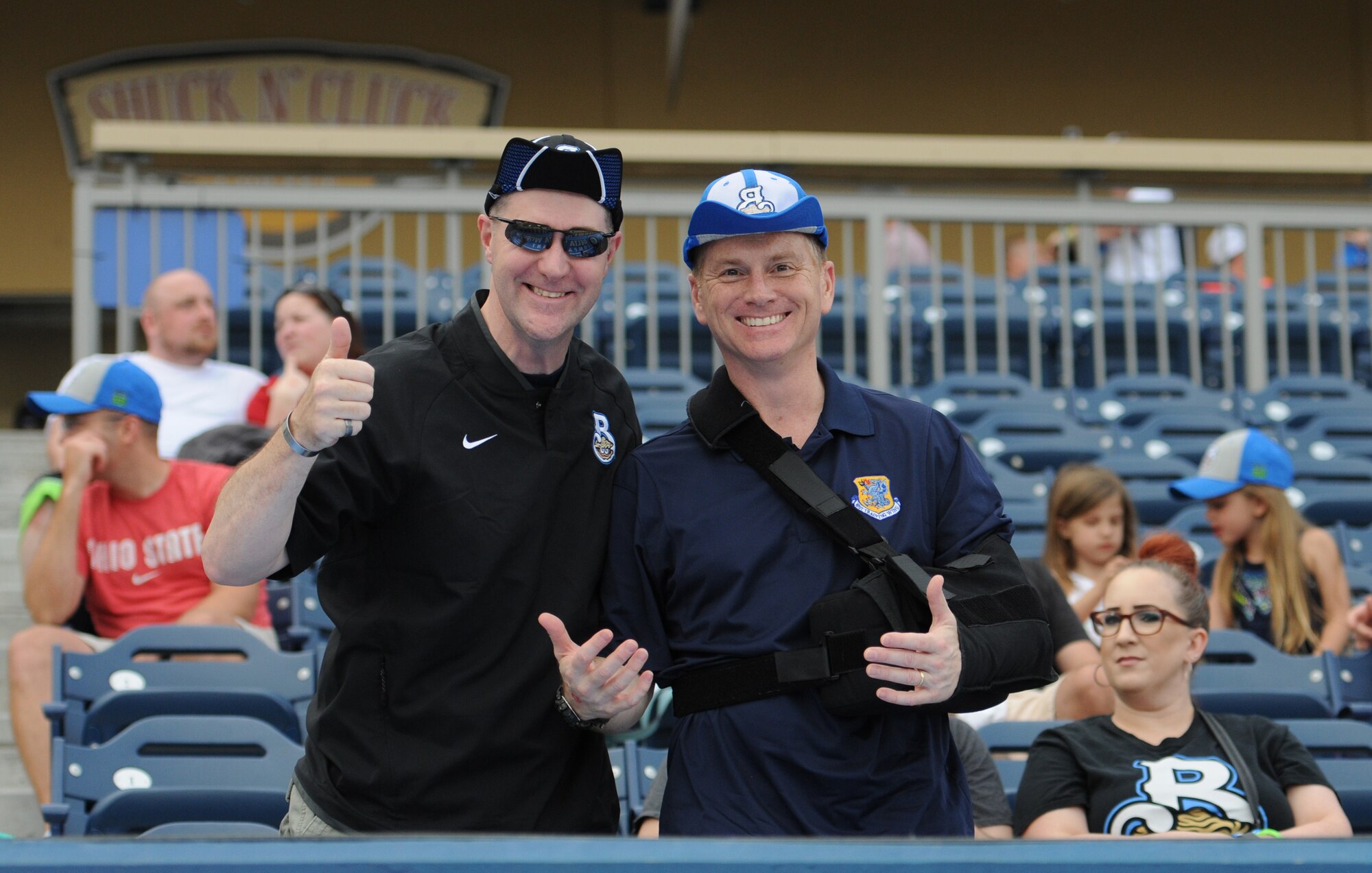 Maj. Michael Manning, 81st Training Support Squadron commander, and Col. Dennis Scarborough, 81st Training Wing vice commander, put their “rally caps” on during the “Boots versus Badges” softball game at the Biloxi Shuckers MGM Park April 21, 2016, Biloxi, Miss. The game was the kickoff event for the 2016 Special Olympics Mississippi Summer Games, which will be hosted by Keesler Air Force Base, Miss., May 20-21. (U.S. Air Force photo by Kemberly Groue)