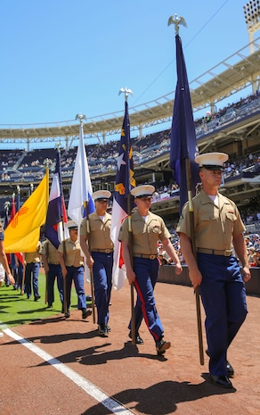 Marines from Marine Corps Recruit Depot San Diego march off the field with the state flags during the San Diego Padres Military Opening Day game at Petco Park, April 17. When the national anthem was sung, each Marine presented the flag as an honor to each state.