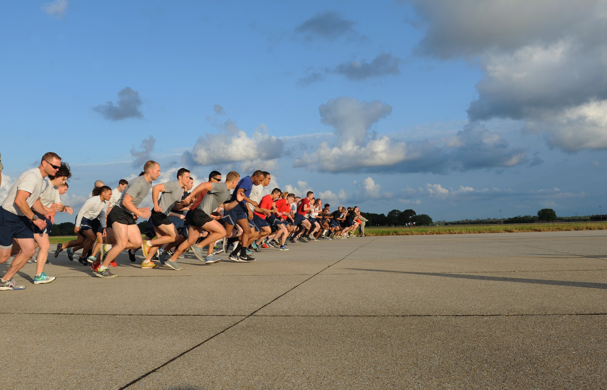 Keesler Airmen begin a 5K run around the flightline April 25, 2016, Keesler Air Force Base, Miss. The run was the kickoff event for a week full of activities supporting Wingman Week. (U.S. Air Force photo by Kemberly Groue)