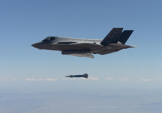 An F-35 Lightning II from the 61st Fighter Squadron deploys a GBU-12 500-pound laser- guided bomb for the first time in the squadron's history April 25, 2016, at the Barry M. Goldwater Range in Gila Bend, Ariz. Three F-35s successfully delivered six inert GBU-12s during the practice sortie, making the 61st FS the second squadron at Luke Air Force Base to drop bombs from the F-35. (U.S. Air Force photo by Airman 1st Class Ridge Shan)