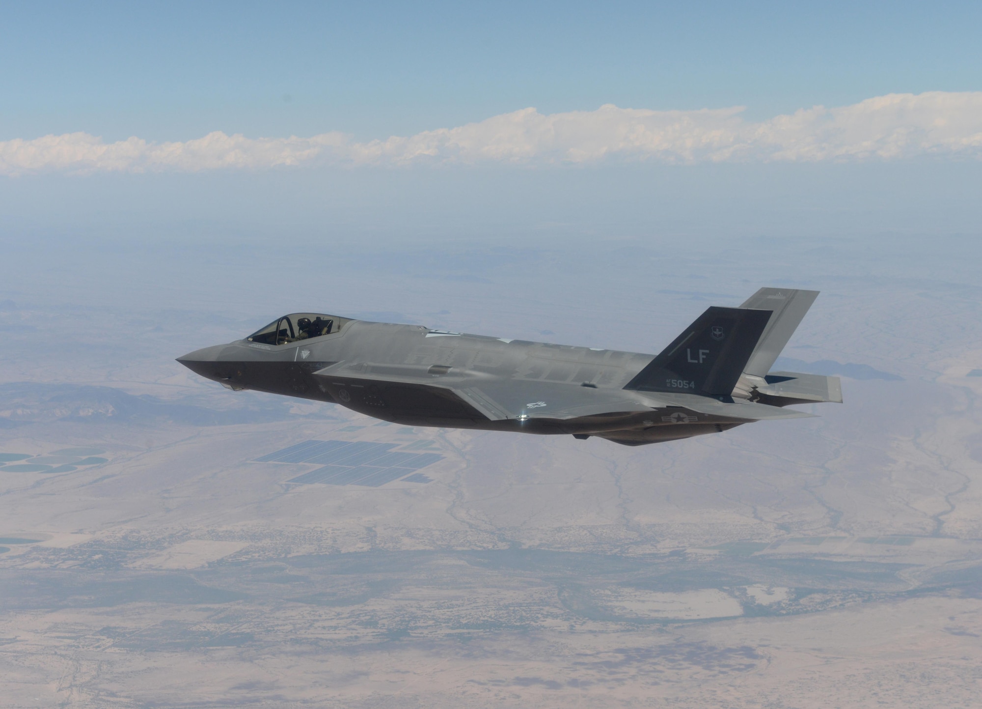 An F-35 Lightning II from the 61st Fighter Squadron lines up into an attack route in preparation to drop a GBU-12 500-pound laser-guided bomb, April 25, 2016, at the Barry M. Goldwater Range in Gila Bend, Ariz. Three F-35s successfully delivered six inert GBU-12s during the practice bombing, making the 61st FS the second squadron at Luke Air Force Base to drop bombs from the F-35. (U.S. Air Force photo by Airman 1st Class Ridge Shan)