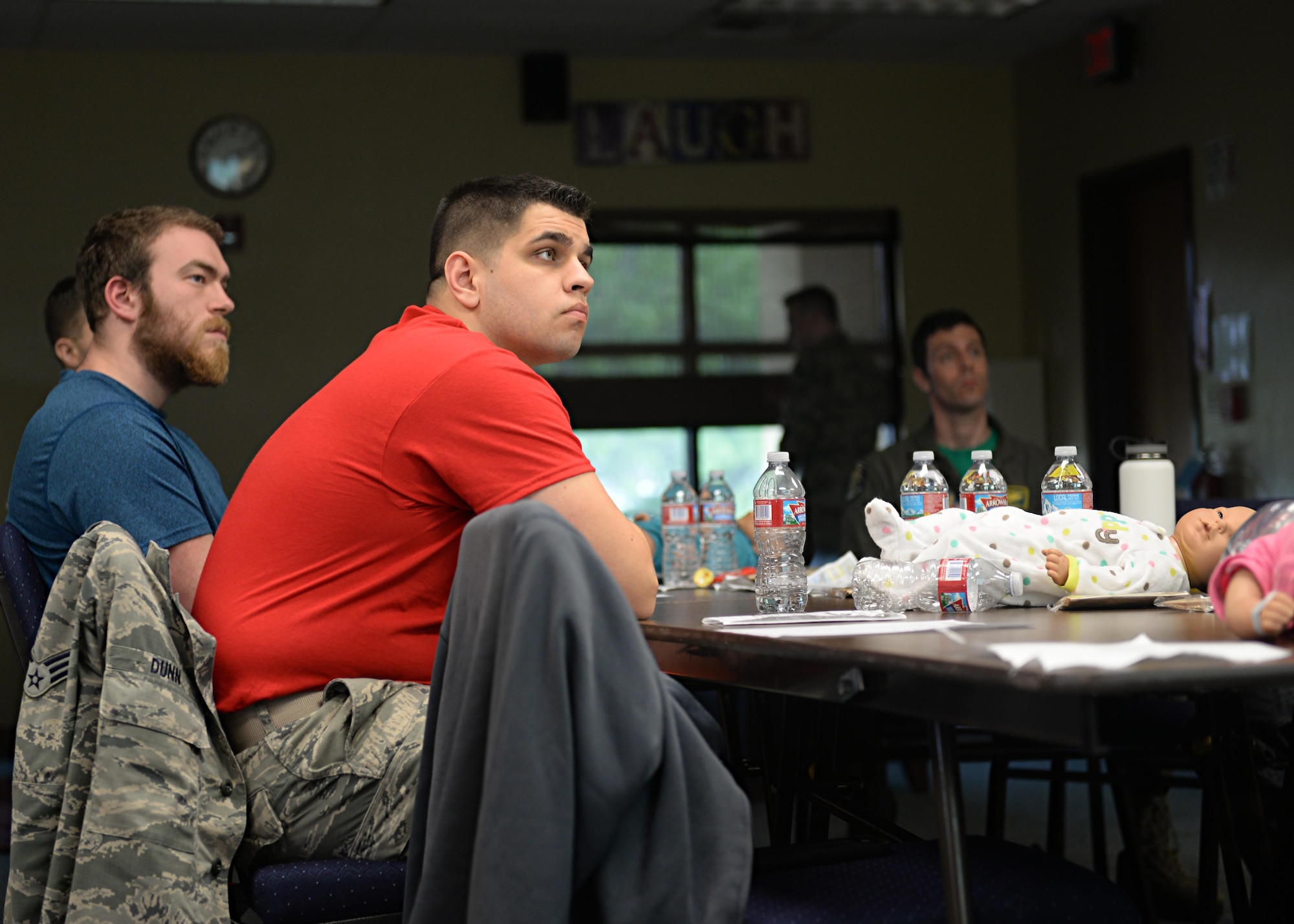 Senior Airmen Frank Dunn, 9th Medical Operations Squadron mental health technician, attends Dads 101 class April 22, 2016, at Beale Air Force Base, California.  The course is designed to assist all fathers; soon to be, new and multiple children fathers with pre and post-birth of their newborn. Some of the topics the course covers are diaper changing, handling newborns, building attachment and ways to assist their spouse. (U.S. Air Force photo by Ramon A. Adelan) 