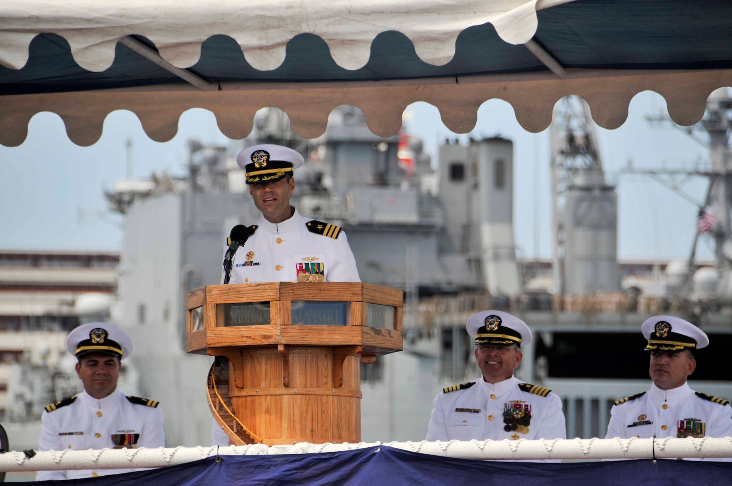 JOINT BASE PEARL HARBOR-HICKAM, Hawaii (July 31, 2014) Cmdr. Scott McGinnis addresses the crew of the Los Angeles-class fast attack submarine USS Houston (SSN 713) after relieving Cmdr. Paul Davis as commanding officer during a change of command ceremony.