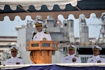 JOINT BASE PEARL HARBOR-HICKAM, Hawaii (July 31, 2014) Cmdr. Scott McGinnis addresses the crew of the Los Angeles-class fast attack submarine USS Houston (SSN 713) after relieving Cmdr. Paul Davis as commanding officer during a change of command ceremony.