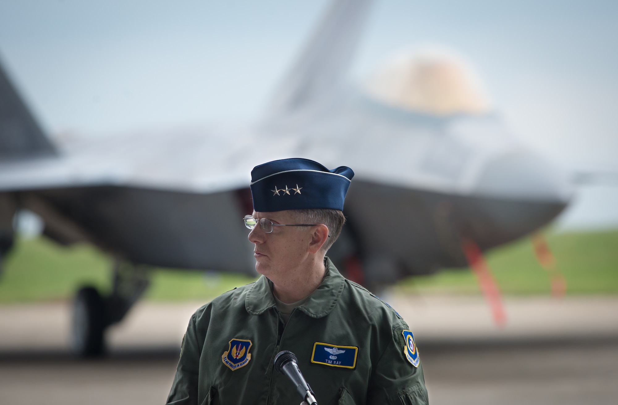 Lt. Gen. Timothy Ray, 3rd Air Force and 17th Expeditionary Air Force commander, speaks during a press conference on the flightline at Mihail Kogalniceanu Air Base, Romania, April 25, 2016. The general answered reporters' questions about the U.S. Air Force F-22A Raptor training deployment in Europe as part of the European Reassurance Initiative. The aircraft will conduct air training with other Europe-based aircraft and forward deploy from RAF Lakenheath, England, to maximize training opportunities while demonstrating the U.S. commitment to NATO allies and the security of Europe. The Raptors are deployed from the 95th Fighter Squadron, Tyndall Air Force Base, Florida.(U.S. Air Force photo by Tech. Sgt. Ryan Crane/Released)
