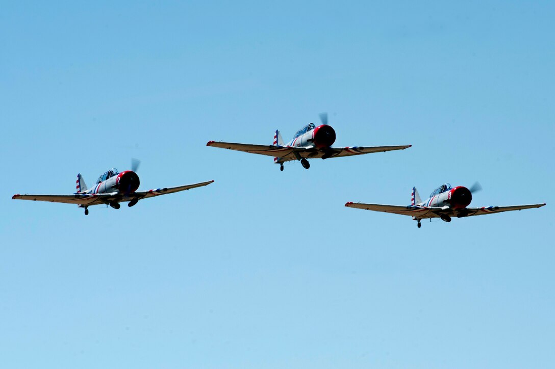 The Geico Skytypers fly in formation during the AirPower over Hampton Roads Open House at Langley Air Force Base, Va., April 24, 2016. The team performs a low-altitude, precision-formation flying demonstration filling the sky to provide spectators a unique viewing experience while showcasing tactical maneuvers utilized in WWII and the Korean War. (U.S. Air Force photo by Senior Airman R. Alex Durbin)