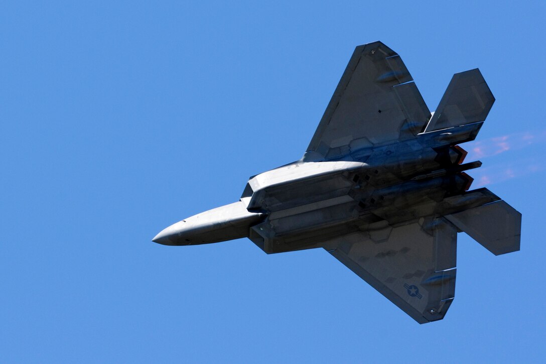 A U.S. Air Force F-22 Raptor soars above the AirPower over Hampton Roads Open House crowd at Langley Air Force Base, Va., April 24, 2016. In its demonstration, the aircraft showed stealth, supercruise, maneuverability, and integrated avionic warfighting capabilities. (U.S. Air Force photo by Staff Sgt. Natasha Stannard)