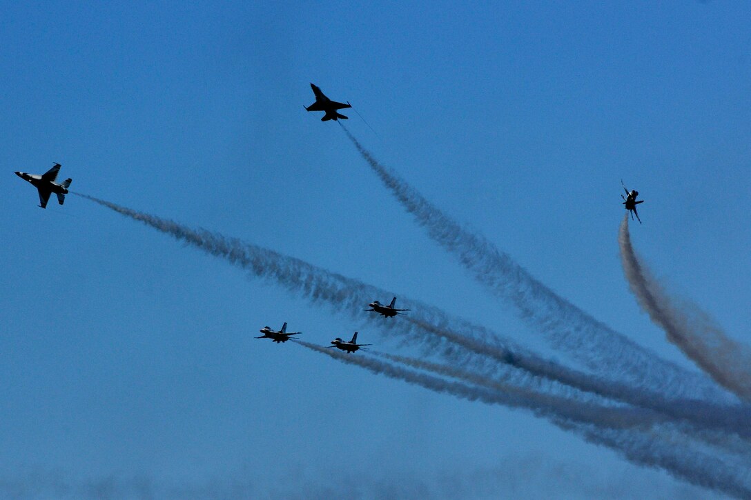 The U.S. Air Force Thunderbirds aerial demonstration team perform the delta burst during AirPower over Hampton Roads Open House at Langley Air Force Base, Va., April 24, 2016. The team’s demonstration included performing formation and solo flying routines. (U.S. Air Force photo by Staff Sgt. Natasha Stannard)