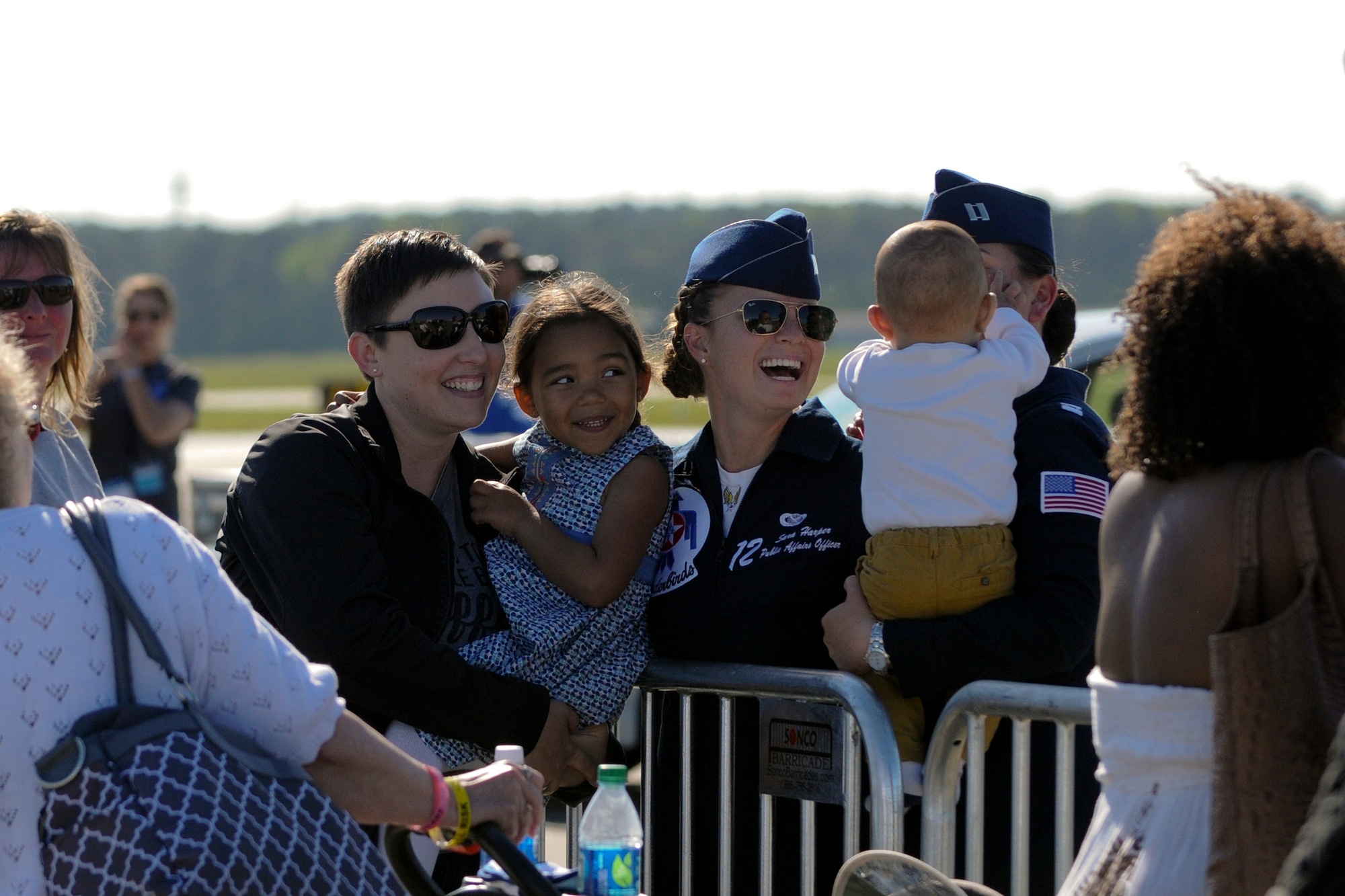 U.S. Air Force Capt. Sara Harper, the public affairs officer for the U.S. Air Force Thunderbirds aerial demonstration team, meets with AirPower Over Hampton Roads attendees at Langley Air Force Base, Va., April 24, 2016. During their visit to Hampton Roads, the Thunderbirds not only performed, but visited local schools, were a part of a re-enlistment and met with Special Olympics athletes. (U.S. Air Force photo by Staff Sgt. Natasha Stannard)