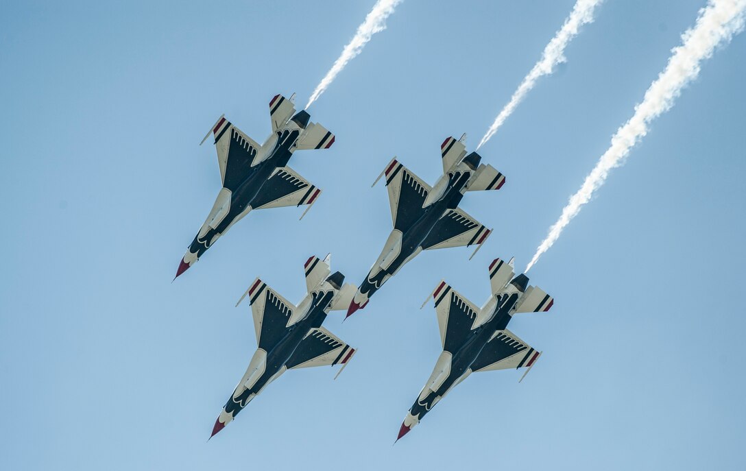 The U.S. Air Force Thunderbirds fly in formation during the AirPower over Hampton Roads Open House at Langley Air Force Base, Va., April 24, 2016. The Thunderbirds headlined the open house and performed precision aerial maneuvers, demonstrating the capabilities of high performance aircraft to the Hampton Roads community. (U.S. Air Force photo by Senior Airman Kayla Newman)
