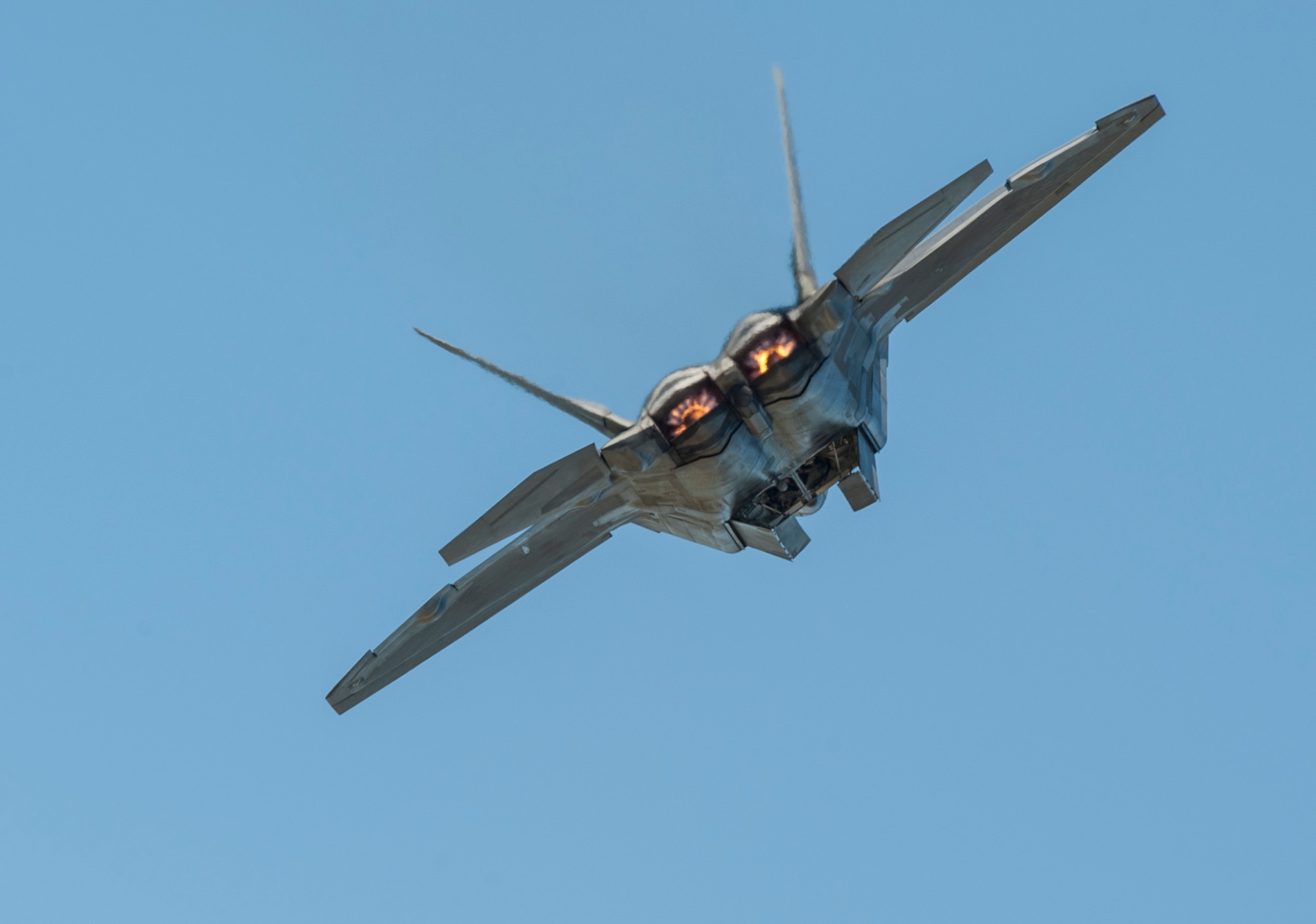 An F-22 Raptor performs an aerial maneuver during the AirPower over Hampton Roads Open House at Langley Air Force Base, Va., April 24, 2016. The Raptor a critical component of the Global Strike Task Force, is designed to project air dominance, rapidly and at great distances and defeat threats attempting to deny access to our nation's Air Force, Army, Navy and Marine Corps. (U.S. Air Force photo by Senior Airman Kayla Newman)
