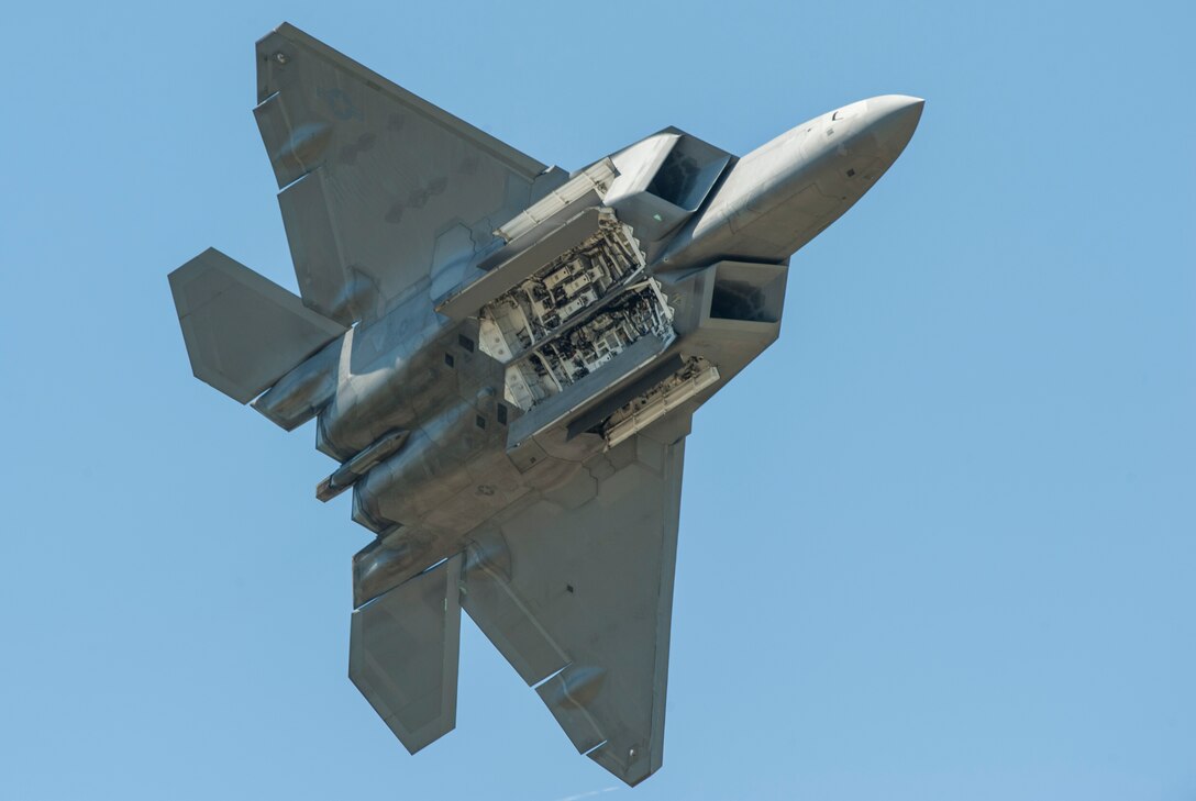 An F-22 Raptor performs in front of a crowd during the AirPower over Hampton Roads Open House at Langley Air Force Base, Va., April 24, 2016. The Raptor is stationed at Langley and travels around the country displaying its unique capabilities. (U.S. Air Force photo by Senior Airman Kayla Newman)
