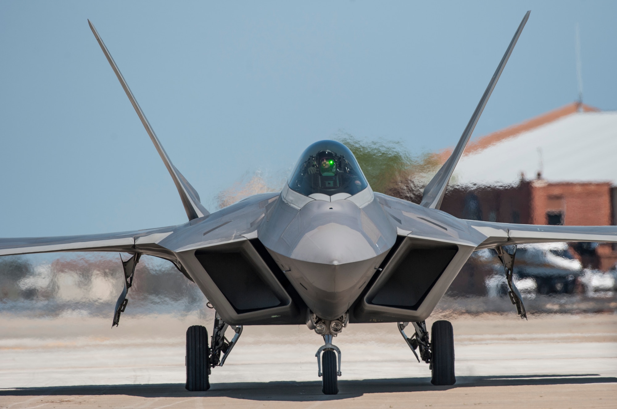 An F-22 Raptor taxis down the flight line prior to taking off during the AirPower over Hampton Roads Open House at Langley Air Force Base, Va., April 24, 2016. The Raptor is part of the Air Combat Command F-22 Demonstration Team and performs precision aerial maneuvers to demonstrate its unique capabilities. (U.S. Air Force photo by Senior Airman Kayla Newman)