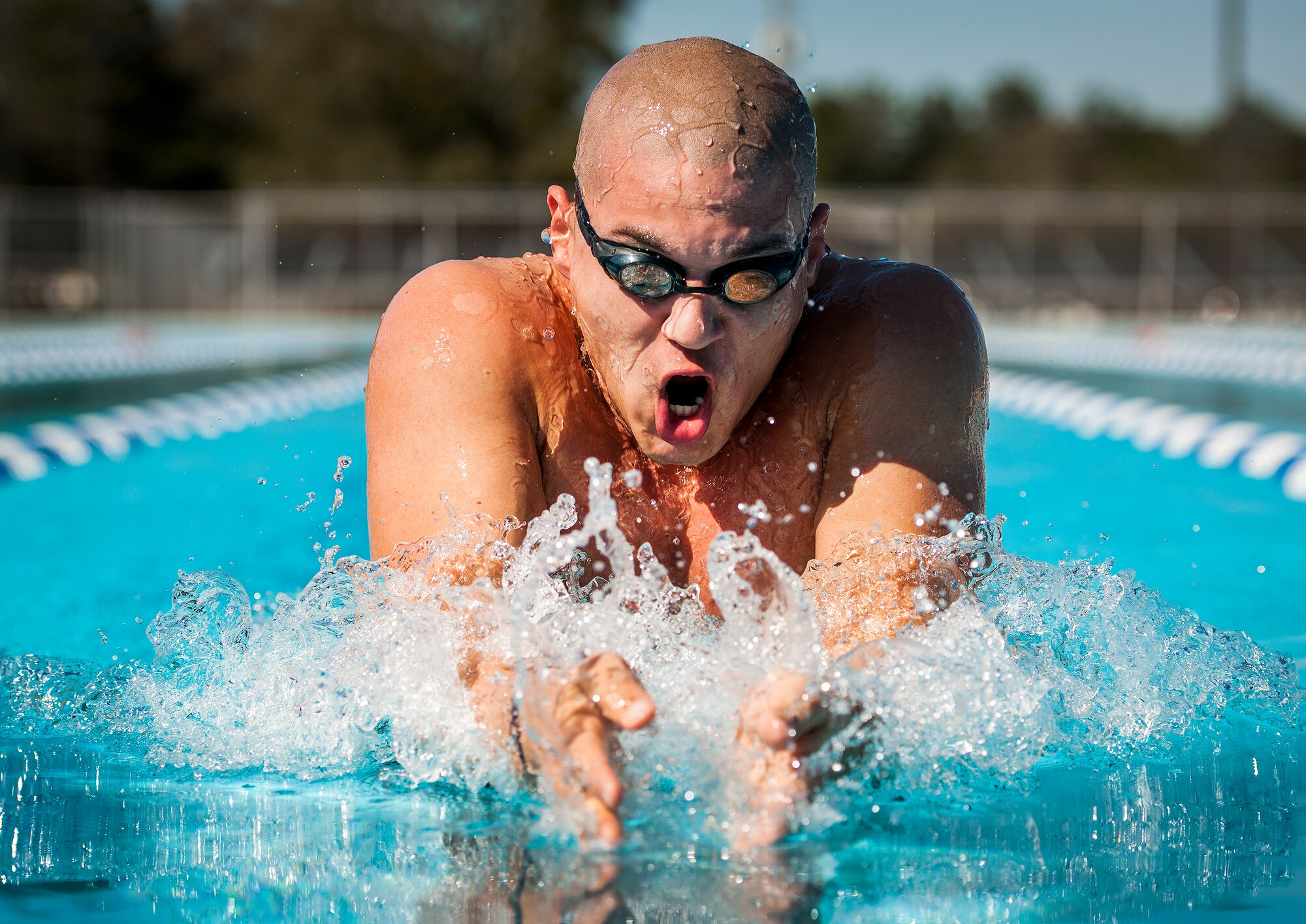 Senior Airman Francisco Perez Castillo, 96th Maintenance Group, comes up for air while swimming the breaststroke March 22 at Eglin Air Force Base, Fla.  The 26-year-old Airman was recently inducted into the Pontifical Catholic University of Puerto Rico Sports Hall of Fame.  (U.S. Air Force photo/Samuel King Jr.)