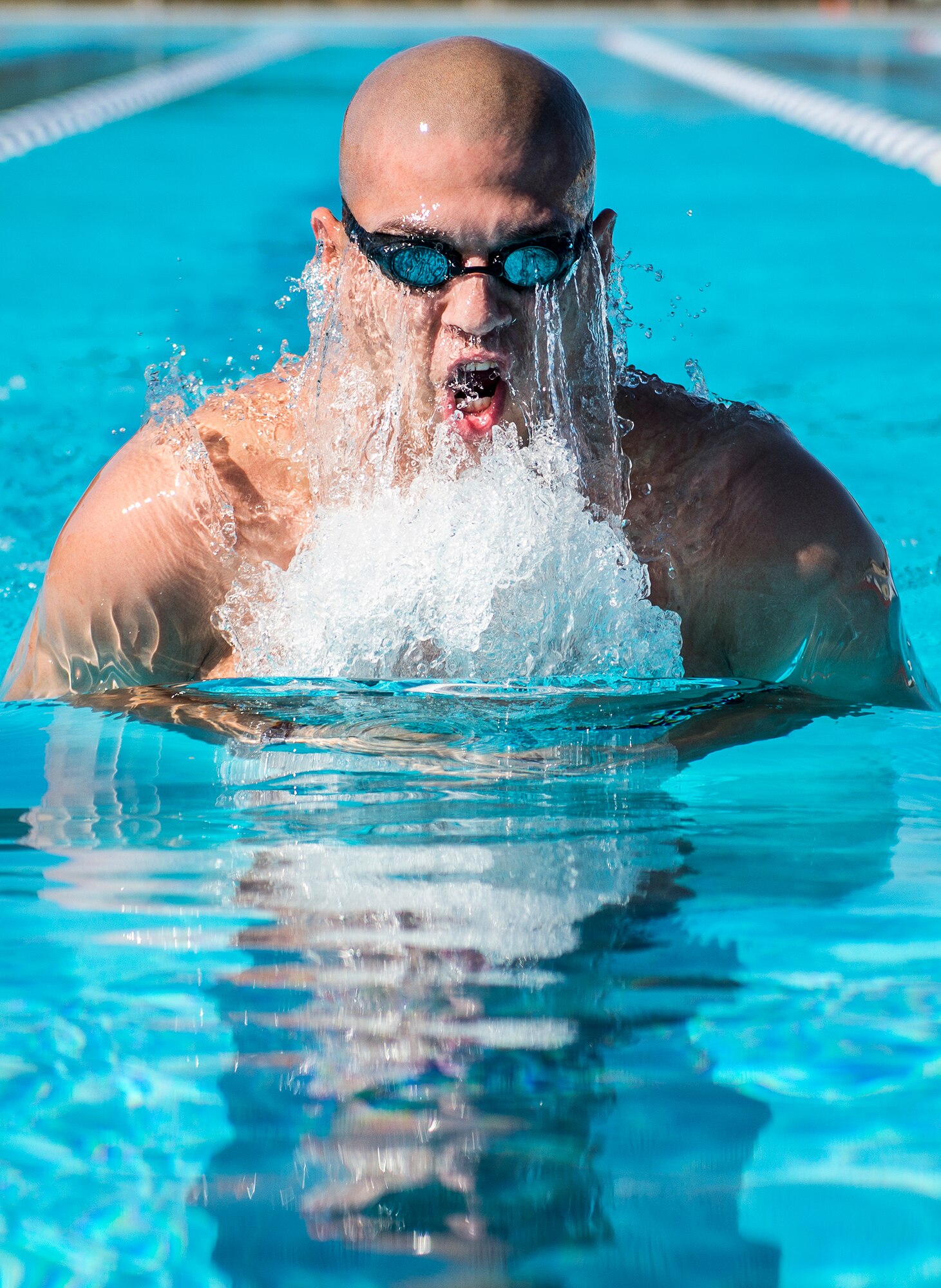 Senior Airman Francisco Perez Castillo, 96th Maintenance Group, comes up for air while swimming the breaststroke March 22 at Eglin Air Force Base, Fla.  The 26-year-old Airman was recently inducted into the Pontifical Catholic University of Puerto Rico Sports Hall of Fame.  (U.S. Air Force photo/Samuel King Jr.)