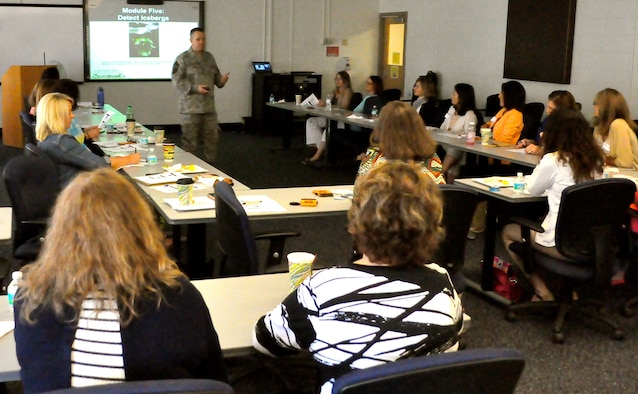 Chief Master Sgt. Ronnie Tabor, one of Eglin’s master resilience trainers, gives resilience training to the Eglin Spouses Club at Eglin Air Force Base March 30.  The training helps the attendees understand and cope with the stressors and changing demands associated with military life.  (Courtesy photo/Angela Stevenson)