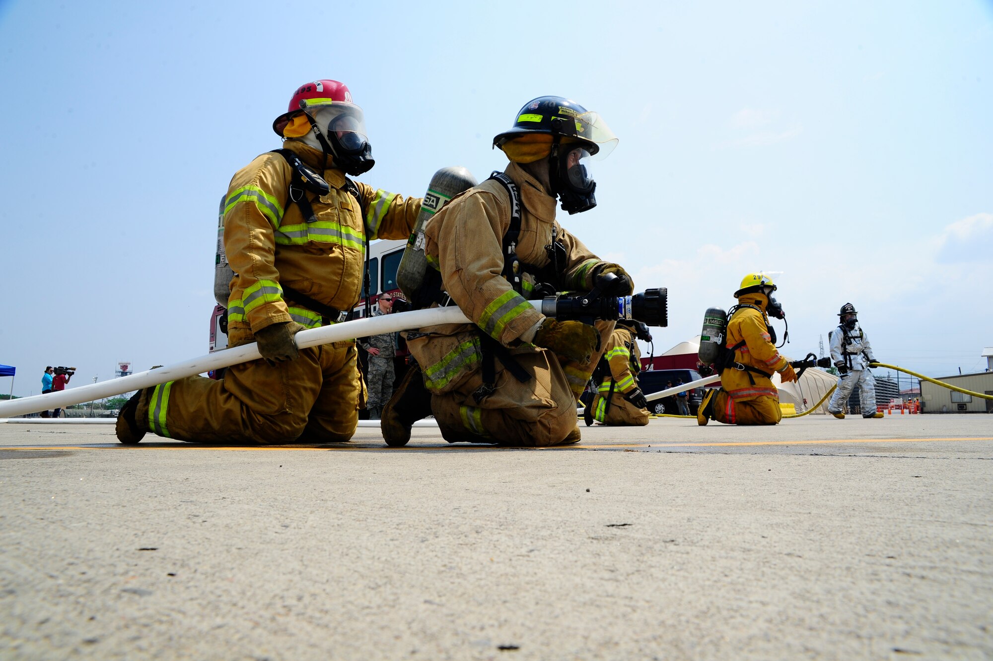 Firefighters from some of the seven Central American nations participate in live-fire training, one of many exercises the 34 participants experienced during a week-long iteration of CENTAM SMOKE (Sharing Mutual Operational Knowledge and Experience), at Soto Cano Air Base, Honduras, April 20, 2016. Joint Task Force-Bravo has trained 866 firefighters from across the region since 2005, providing an opportunity for U.S. and Central American firefighters to work as one, building collaborative relationships as partner nations and allowing those involved to take valuable lessons back to their countries. (U.S. Army photo by Martin Chahin/Released)