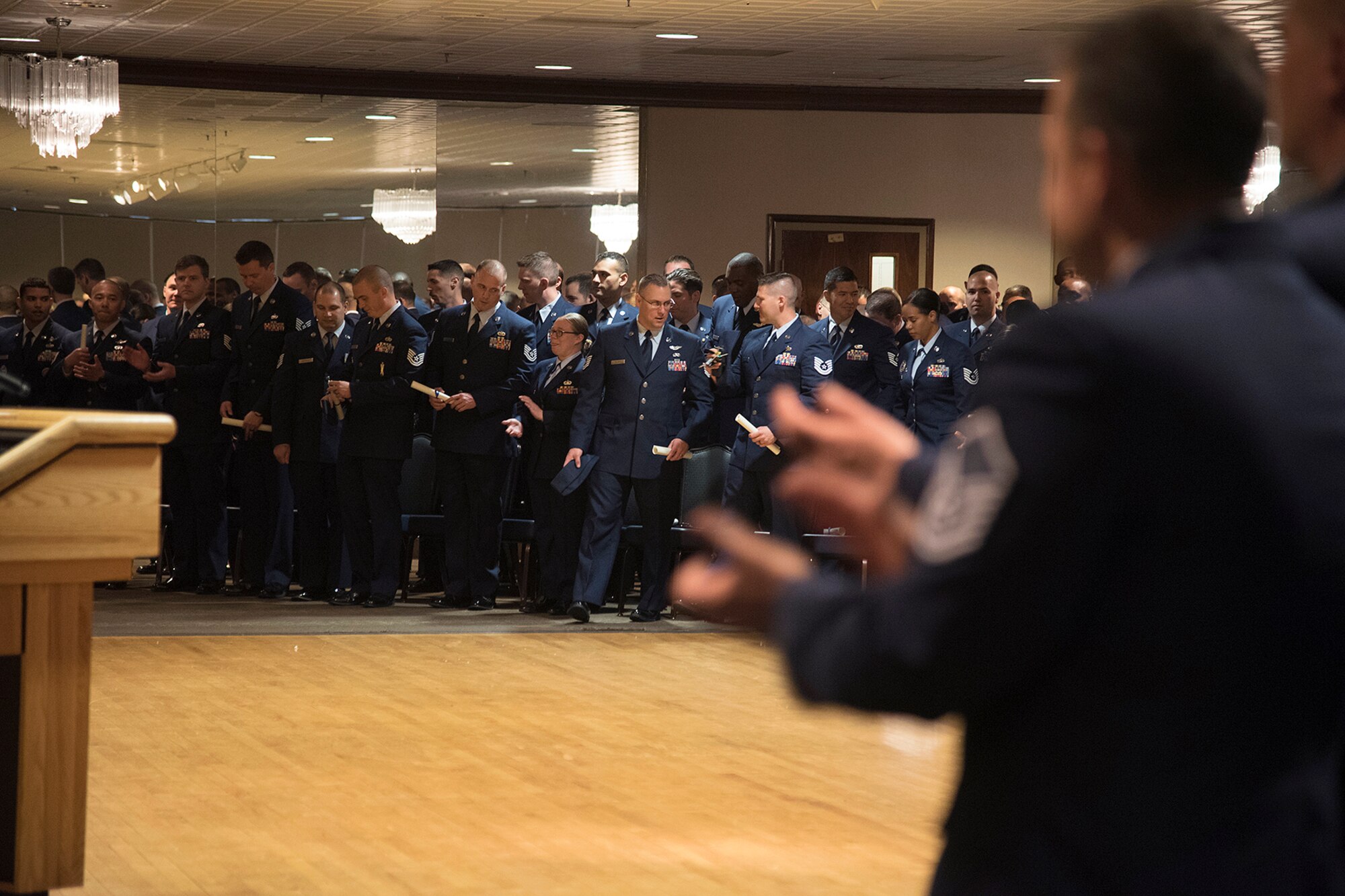 PETERSON AIR FORCE BASE, COLO. – The Forrest L. Vosler Noncommissioned Officer Academy graduated 96 technical sergeants who went through the NCOA’s first class of the new program Intermediate Leadership Experience course at the Peterson Air Force Base Club on April 12, 2016. The Vosler NCOA is the third NCOA to implement the new course and hosted technical sergeants from 14 bases and nine Major Commands. (U.S. Air Force photo by Staff Sgt. Tiffany DeNault)