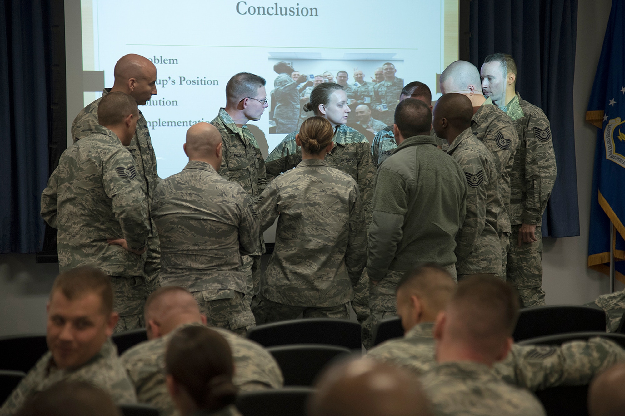 PETERSON AIR FORCE BASE, Colo. – Forrest L. Vosler Noncommissioned Officer Academy students brainstorm a response to one of their fellow students questions during their working group presentations at Peterson Air Force Base, Colo., April 6, 2016. The Vosler NCOA students came together from 14 different bases and nine Major Commands to attend NCOA to continue their leadership and management skill development for future senior NCO ranks. (U.S. Air Force photo by Staff Sgt. Tiffany DeNault)