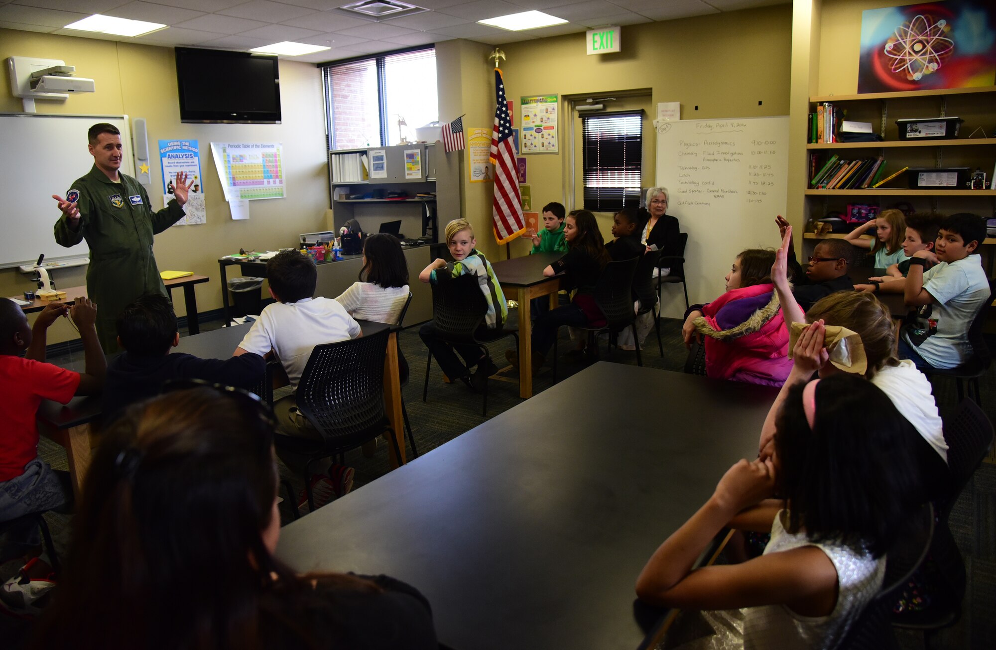 PETERSON AIR FORCE BASE, Colo. - Brig. Gen. Steven Nordhaus, NORAD deputy director of operations, explains the dynamics that enable airplanes to fly to students of Starbase Academy at Peterson Air Force Base, Apr. 8, 2016. Starbase Academy hosts fifth graders from local elementary schools in a five-day learning program teaching them advanced science, technology, engineering and mathematics. (U.S. Air Force photo by Staff Sgt. Amber Grimm)