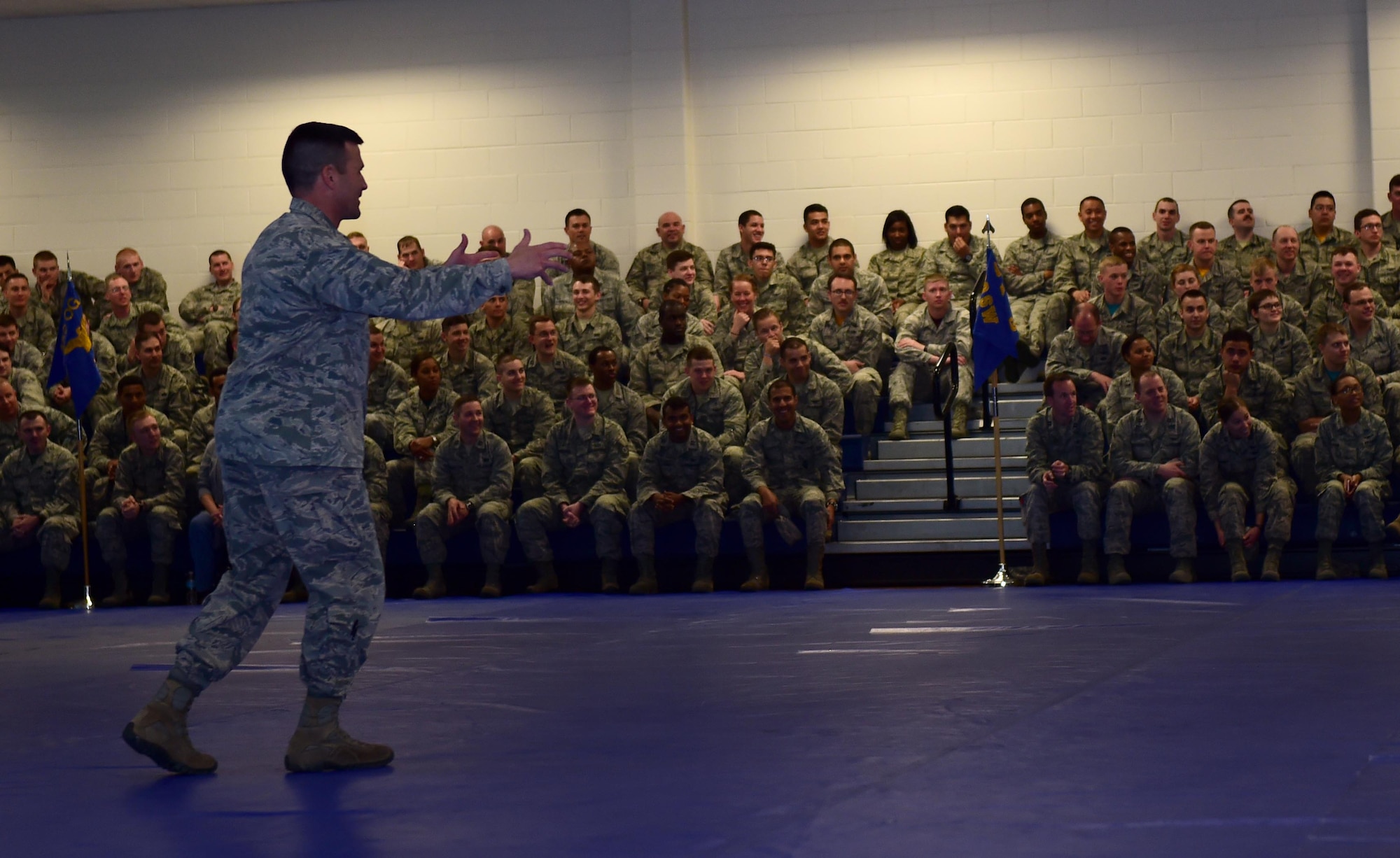 Col. John Wagner, 460th Space Wing commander, speaks during a commander’s call April 22, 2016, at the fitness center on Buckley Air Force Base, Colo. Wagner thanked the wing for their mission support, congratulated award winners and discussed recently completed projects on base. (U.S. Air Force photo by Airman 1st Class Gabrielle Spradling/Released)