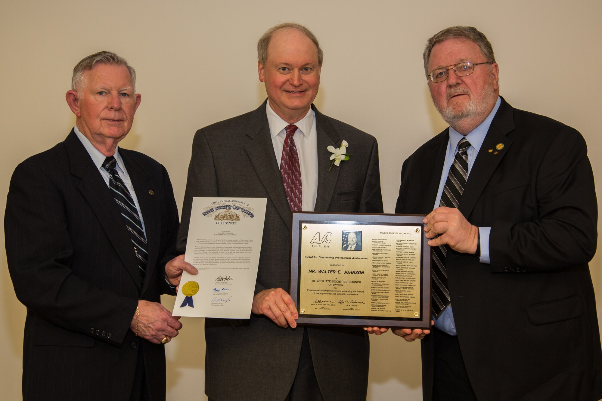 Mr. Walter Johnson (center), AFRL Materials and Manufacturing Directorate researcher, received the Affiliate Societies Council (ASC) Outstanding Engineers' and Scientists' Award at an April 21, 2016, awards banquet from Mr. Lyle Lockwood (left) and Mr. Warren Brown (right).  (Photo courtesy of Affiliate Societies Council/Jim Solomon)