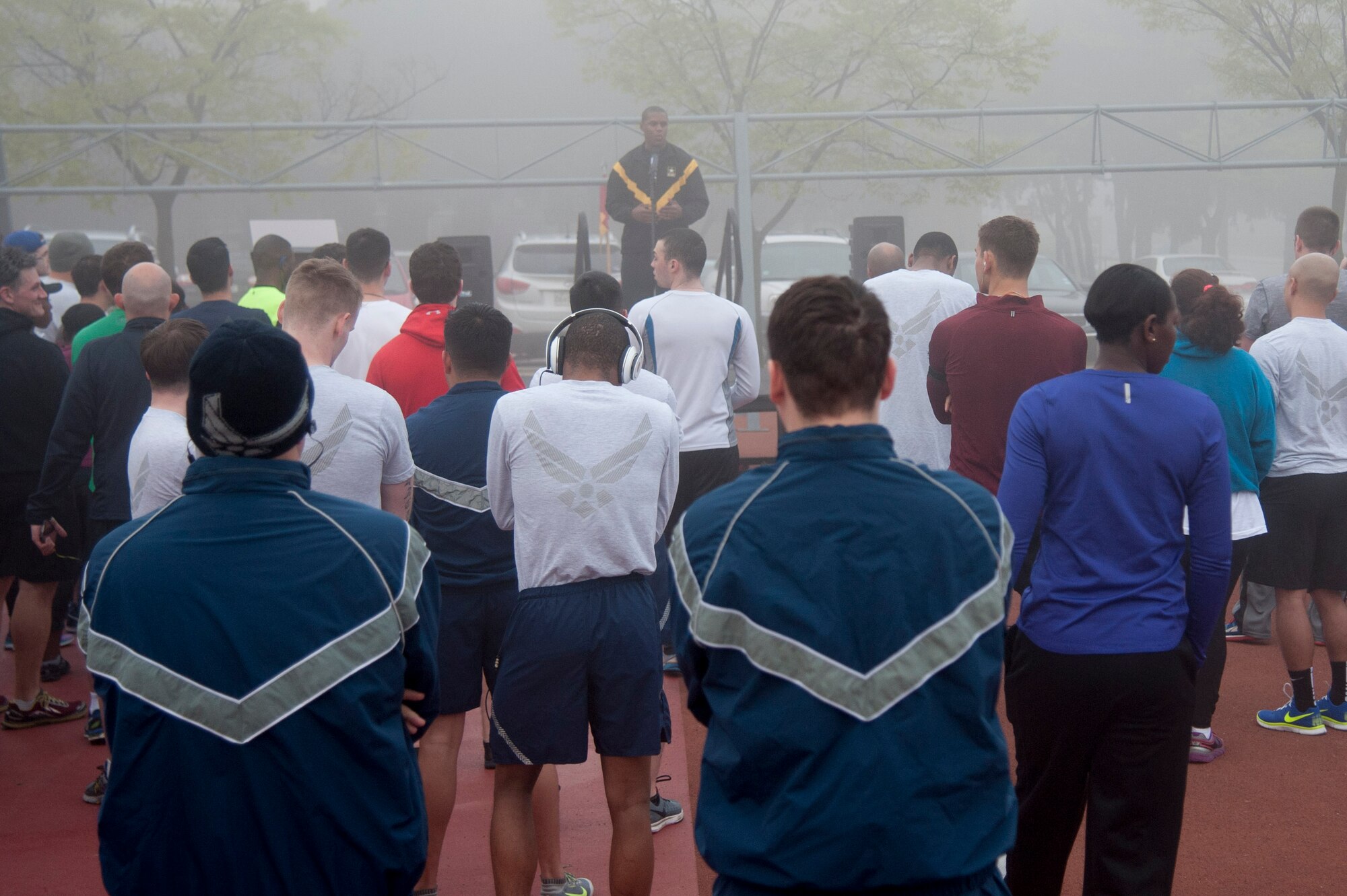 Sgt. 1st Class Marcus Robinson, 35th Air Defense Artillery Brigade sexual harassment assault response and prevention coordinator, gives opening remarks during the Sexual Assault Awareness Prevention Month 5K run on Osan Air Base, Republic of Korea, April 15. The 5K run was one of Osan’s Sexual Assault Awareness Prevention Month events to raise awareness on prevention of sexual assaults. (U.S. Air Force photo by Staff Sgt. Jonathan Steffen/Released)