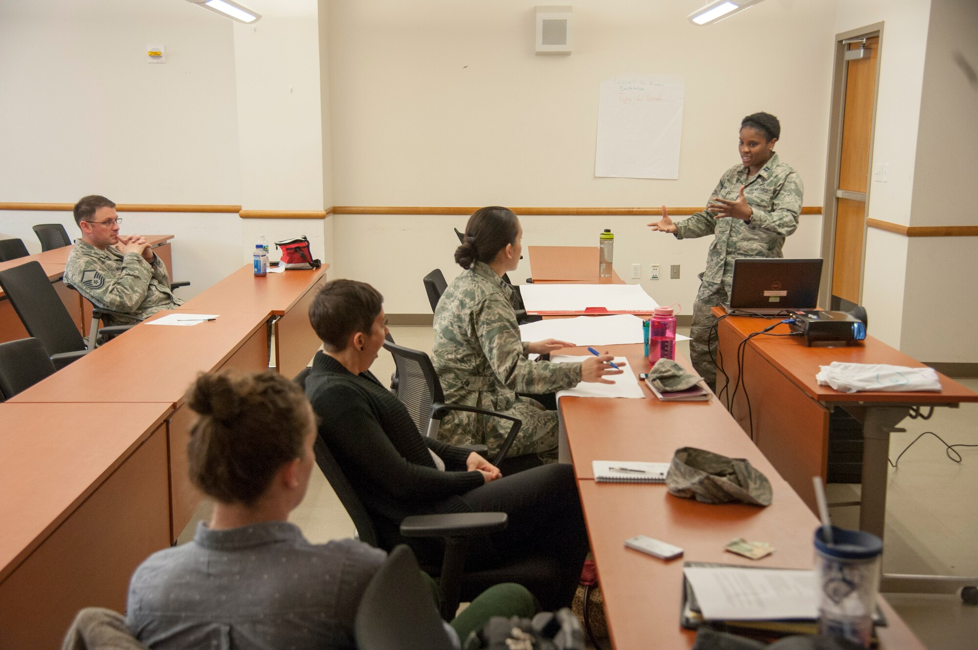 Capt. Sevrena Gordon, right, 51st Fighter Wing sexual assault response coordinator, discusses long distance relationships during the Sexual Assault Awareness Prevention Month “Brown Bag Lunch Series” on Osan Air Base, Republic of Korea, April 13, 2016. The weekly lunch series were discussions on topics intended to bring awareness to sexual assault and how it can be prevented. (U.S. Air Force photo by Staff Sgt. Jonathan Steffen/Released)