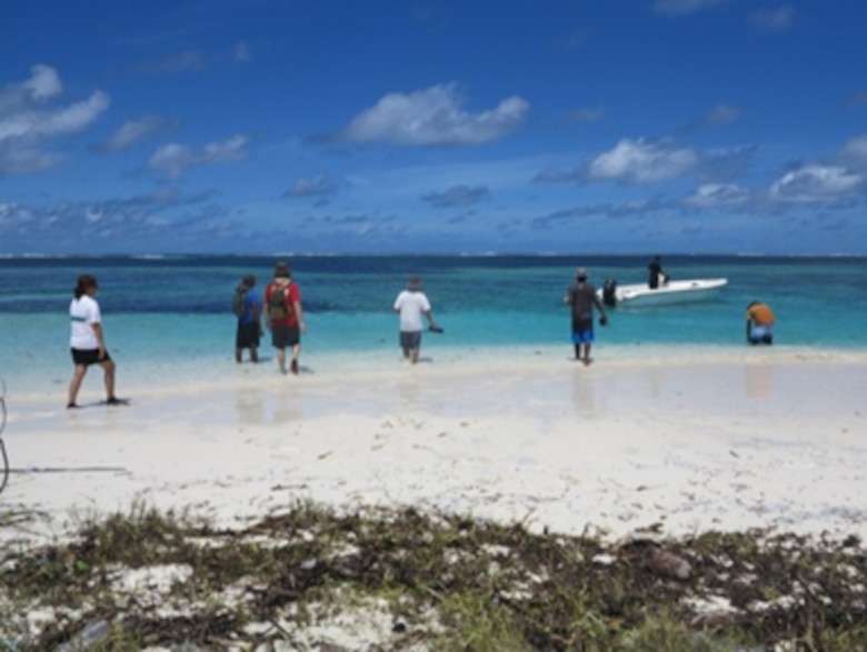 Representatives from USACE, MNDF, and EPA prepare to board a boat after collecting ESI features in Laamu Atoll, Republic of Maldives.