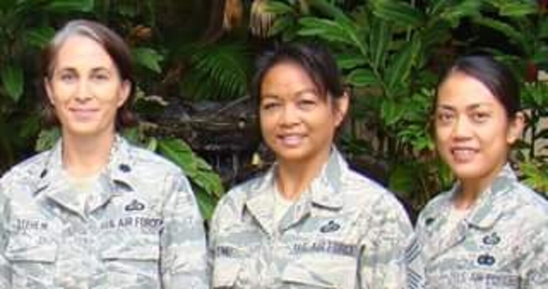 (From left to right) Lt. Col. Sharon Stehlik, Detachment 2 commander, Chief Master Sgt. Josephine Yenke, Det 2 superintendent, and Senior Master Sgt. Nanette Maglinao, Det 2 manager. The Detachment 2 team was named the 2015 Air Force Reserve Command manpower and personnel (A1) Special Recognition Team/Program of the Year.