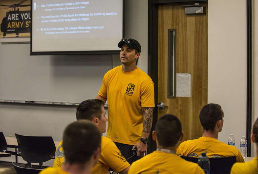 Army ROTC Cadet Joshua Dunn speaks about the history of the ROTC program to his classmates before a 5k fun run held at the University of North Carolina at Charlotte campus, April 23, 2016. This year marks the 100th anniversary of the program that generates about 70 percent of the nation's Military officers. The ROTC program was officially created under the Defense Act of 1916 signed into law by President Woodrow Wilson. (U.S. Army photo Sgt. 1st Class Brian Hamilton/released)